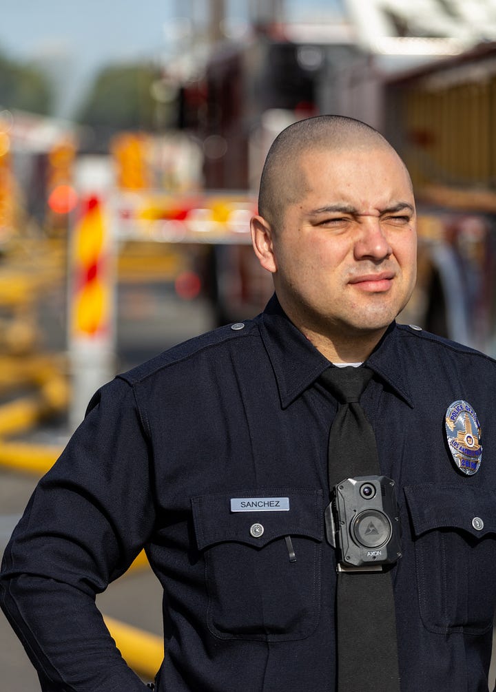 images of firemen working a fire in downtown LA's produce district