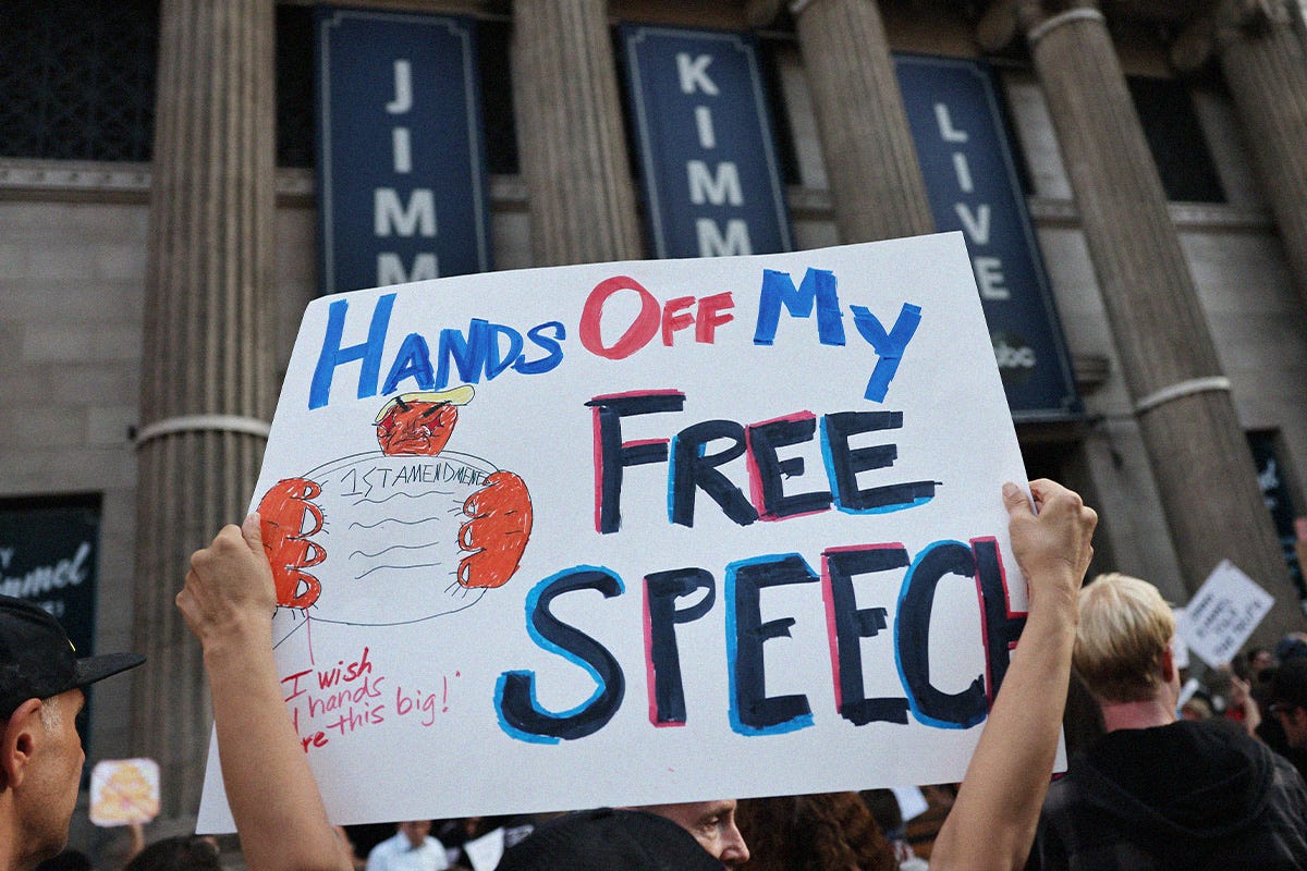 Demonstrator holds up sign reading "Hands off my free speech" in protest the suspension of the "Jimmy Kimmel Live!" show in Hollywood on September 18, 2025