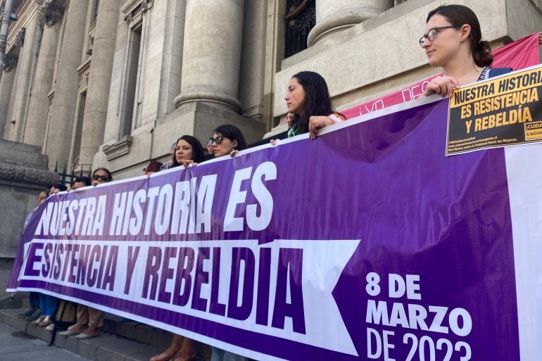 Protestors hold a sign at a rally in favour of abortion rights