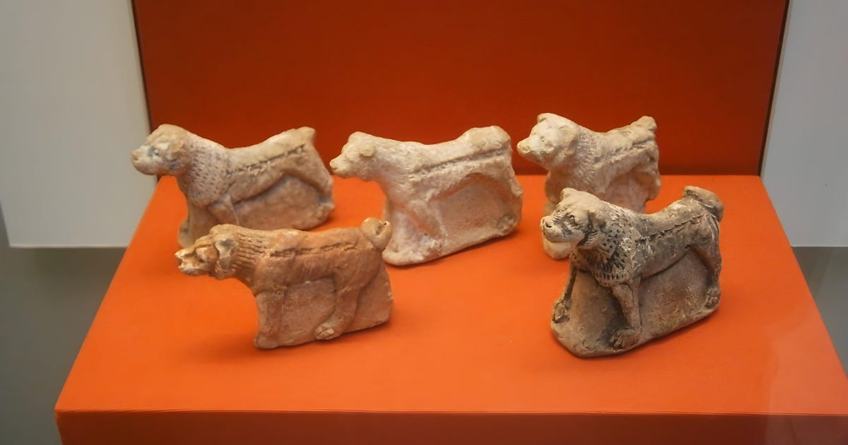 Five painted clay dogs buried under a doorway in Ashurbanipal’s North Palace at Nineveh, about 645 BC, each inscribed with its name. British Museum, London.