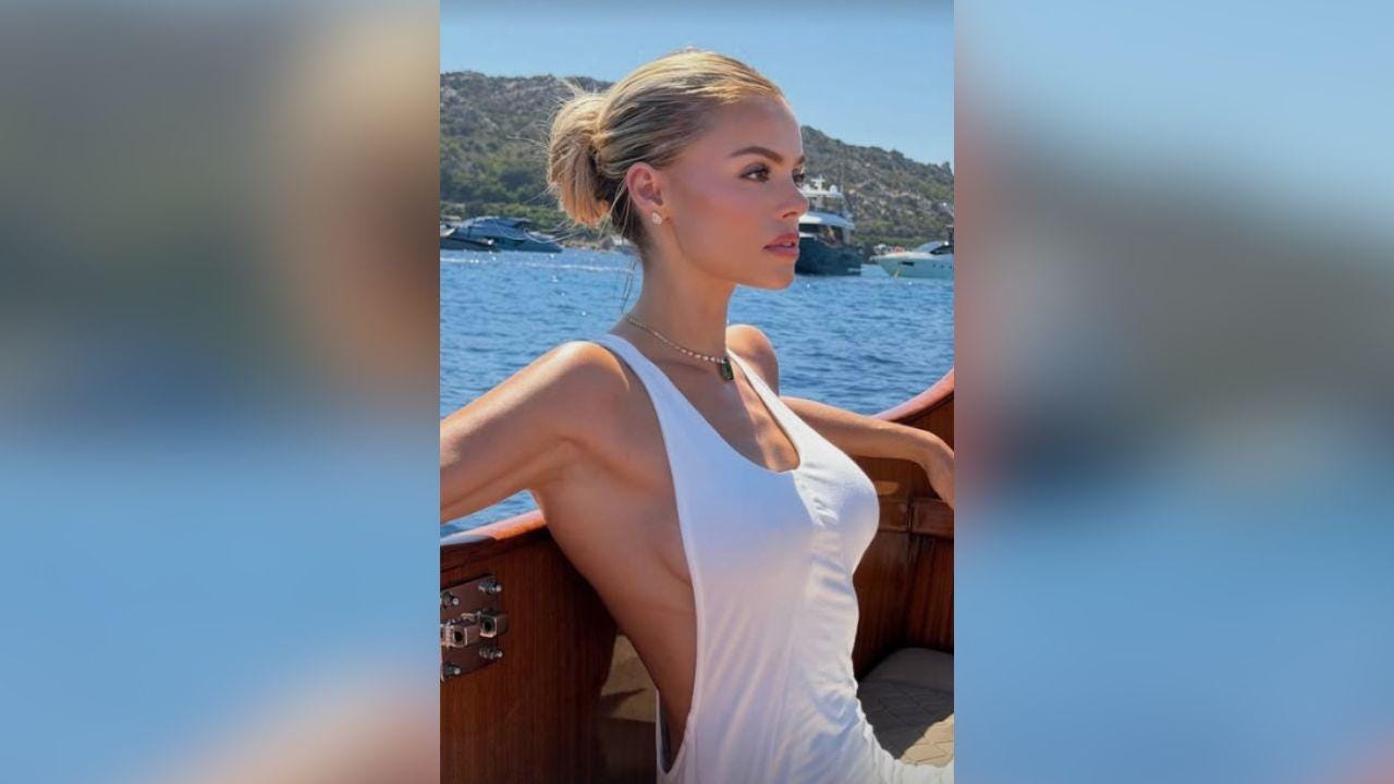 Image of Brooks Nader's father was on the boat while she jumped off topless. Image of Brooks Nader's father was on the boat while she jumped off topless.