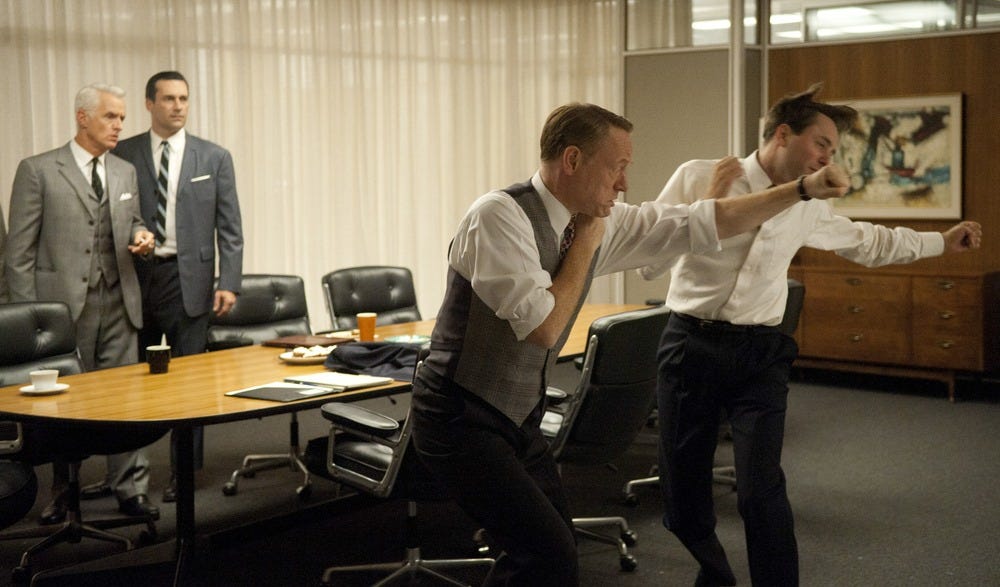 Ka-pow! Lane decks Pete on 'Mad Men' Ka-pow! Lane decks Pete on 'Mad Men'