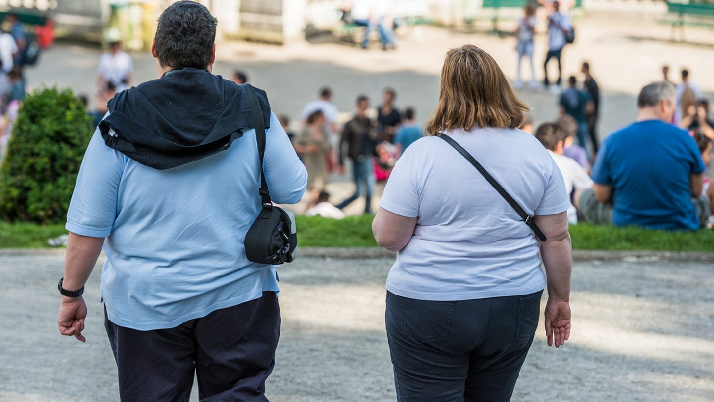 Obesity tied to shorter life, overweight people more years with heart ...