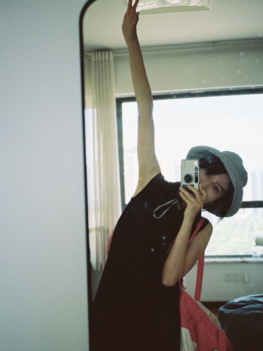 她和她的胶片相机