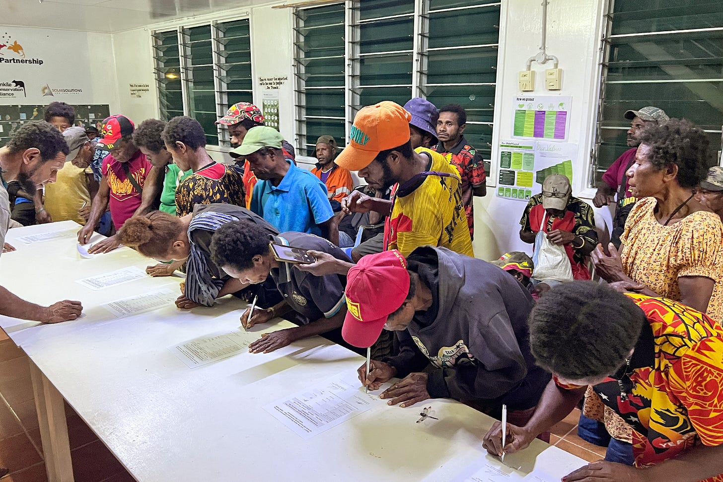In all, 266 leaders from 41 villages signed the conservation deed for the Torricelli Mountain Range Conservation Area. Image courtesy of the Tenkile Conservation Alliance. In all, 266 leaders from 41 villages signed the conservation deed for the Torricelli Mountain Range Conservation Area. Image courtesy of the Tenkile Conservation Alliance.