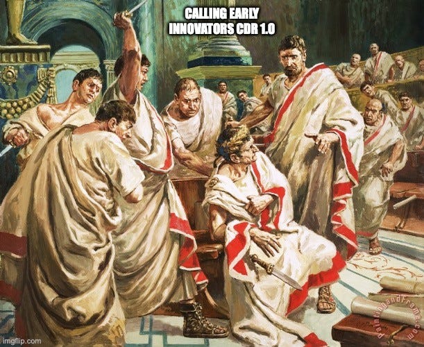 Classical painting of the assassination of Julius Caesar, senators in togas raising daggers around him in the Senate. Caption at the top: "CALLING EARLY INNOVATORS CDR 1.0"