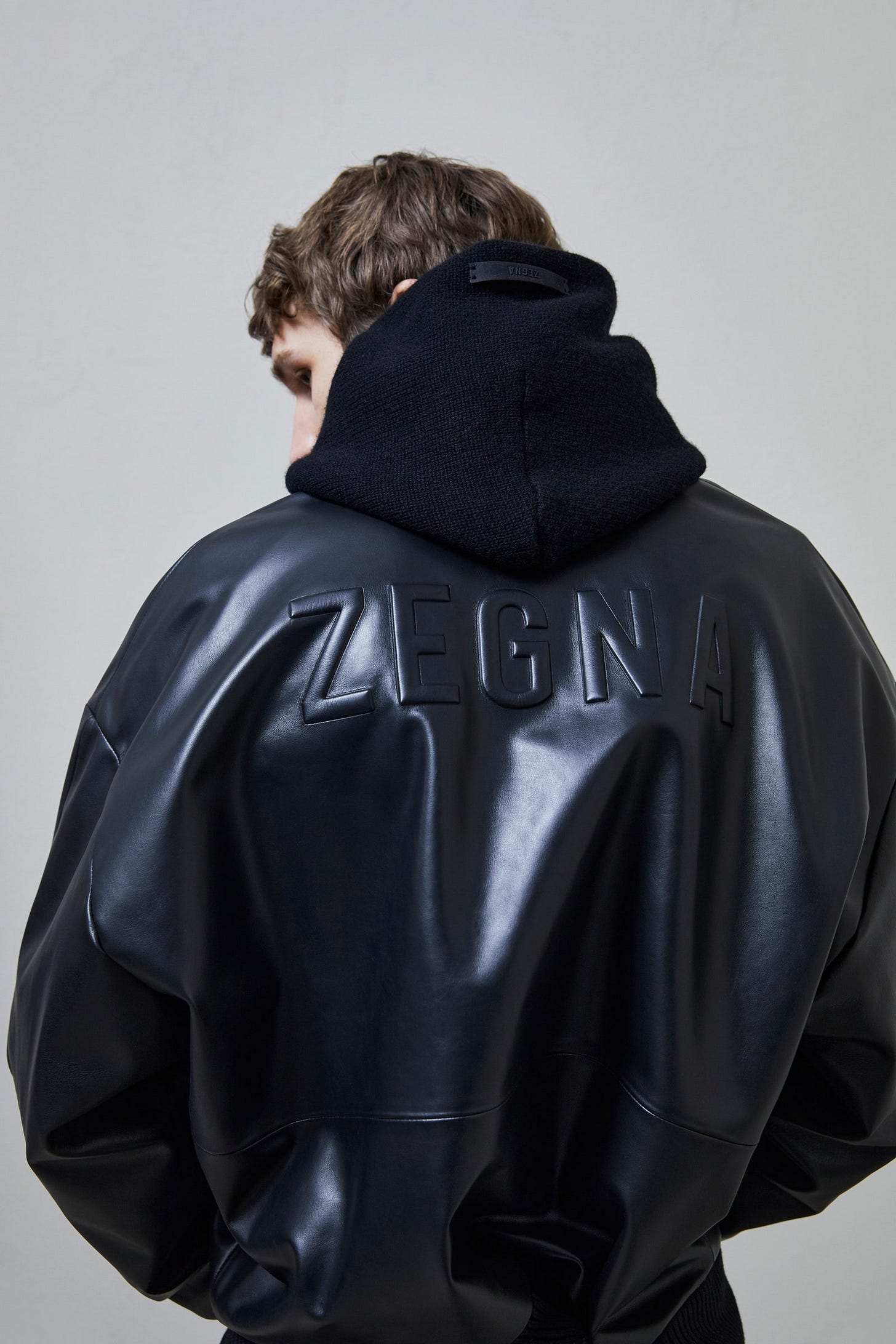 Image may contain Clothing Apparel Coat and Jacket