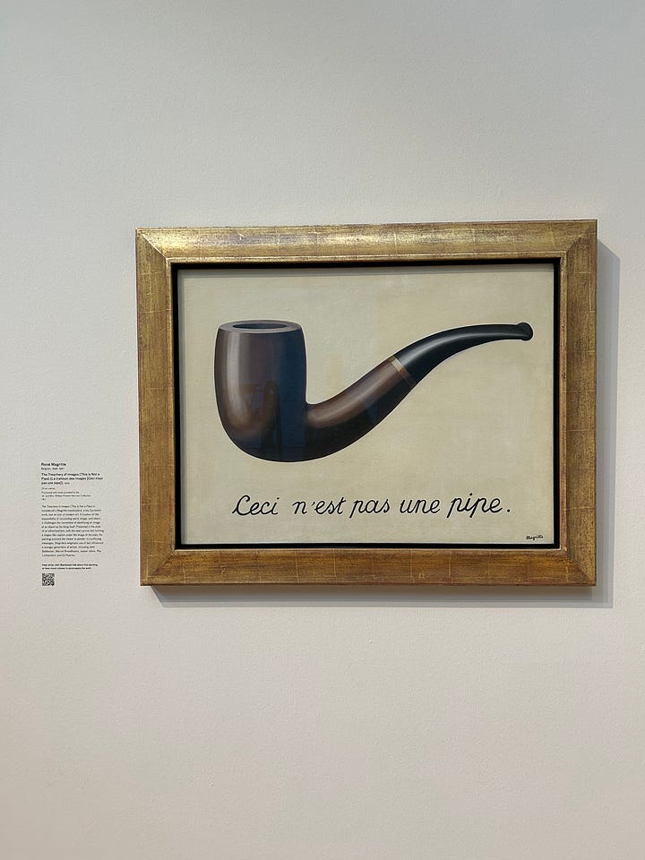 Urban Lights at sunset, Mark Bradford’s 150 Portrait Tone, a mural across a wall with Blank Panthers in it, lunch on a table outside, fluorescent lightblubs on their side on the wall, Magritte's The Treachery of Images, and a painting by Diego Rivera.