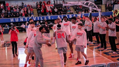 NMSU’s band: Different? Brackets after men’s semifinals, Tops stretching underneath the stands, and press conference post-MTSU