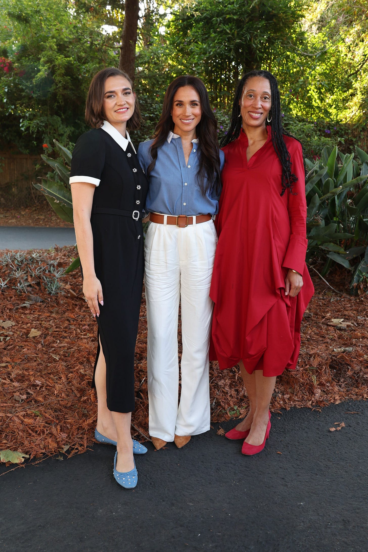 Image may contain Larissa May Meghan Duchess of Sussex Blouse Clothing Pants Photography Face Head and Person