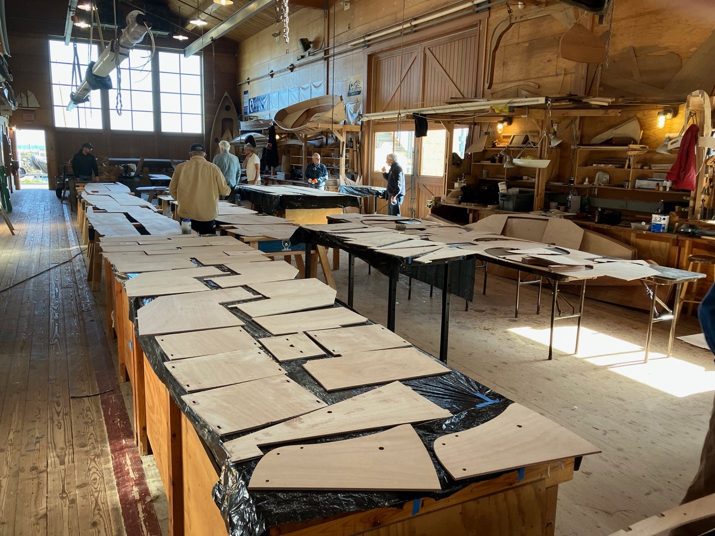 A group of people in a workshop

AI-generated content may be incorrect.