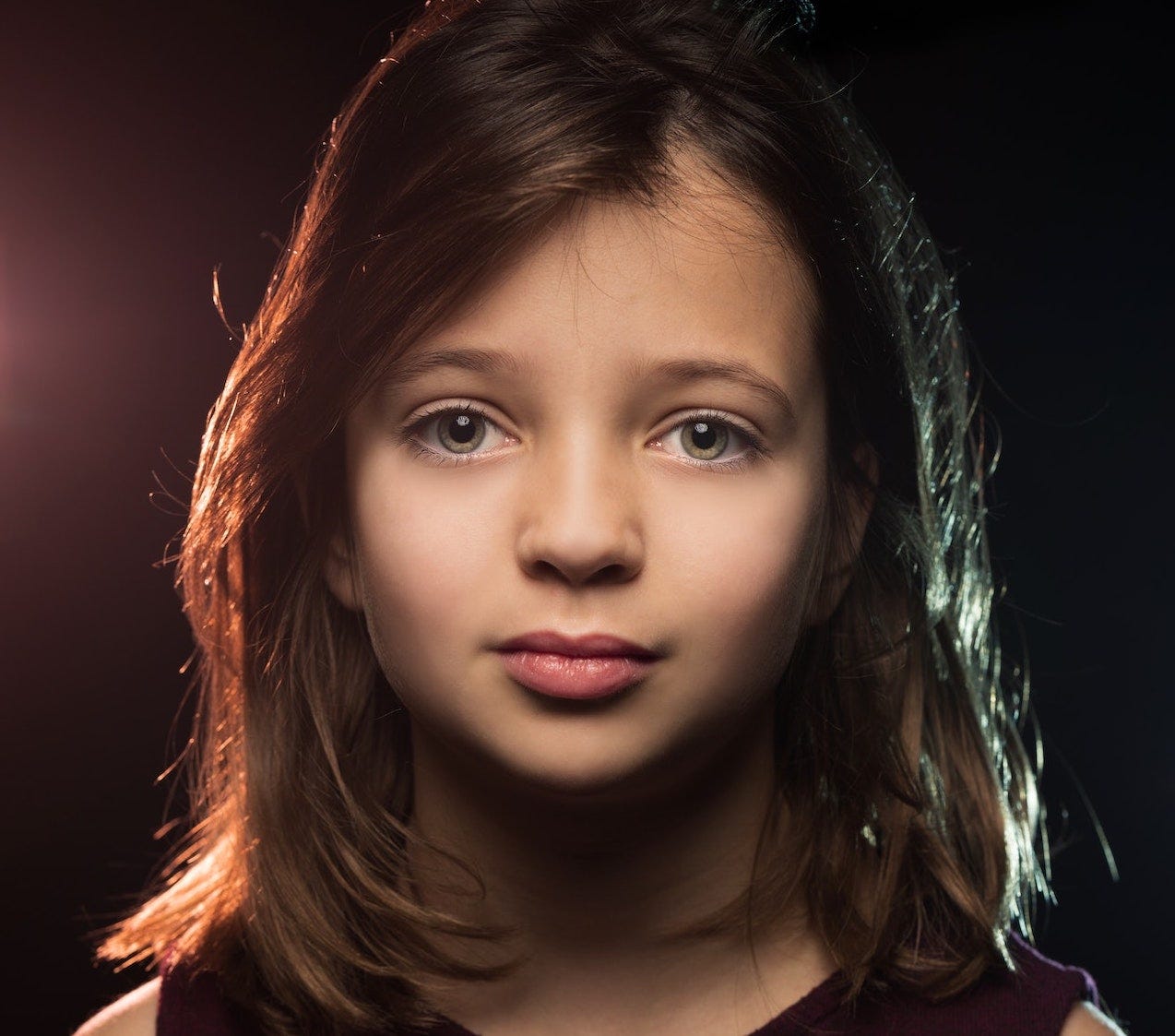 A girl with brown hair staring at you A girl with brown hair staring at you