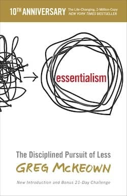 Book cover of 'Essentialism: The Disciplined Pursuit of Less' by Greg McKeown, featuring the title in red among abstract black lines.