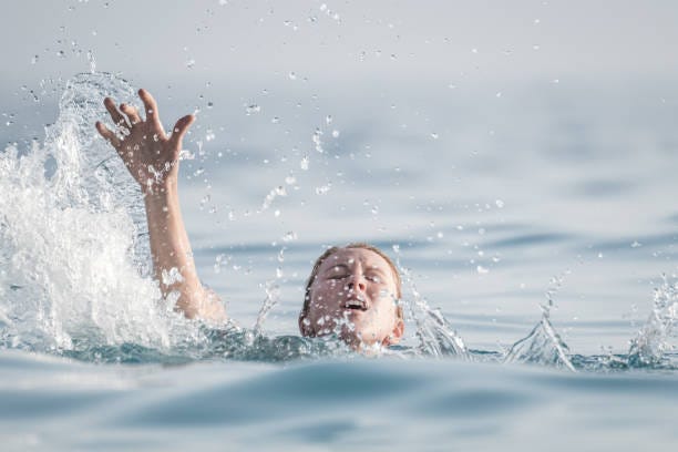 9,800+ Person Drowning Stock Photos, Pictures & Royalty-Free Images -  iStock | Person drowning underwater, Person drowning in trash, Person  drowning icon