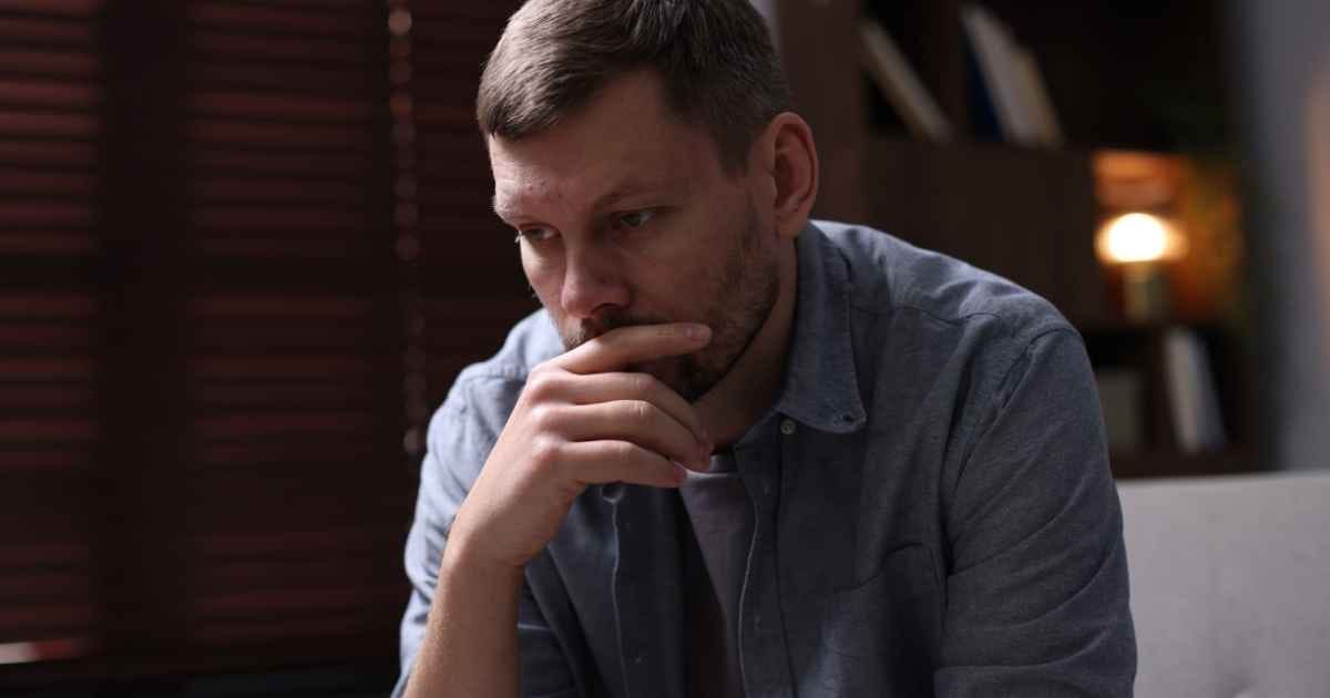 Depressed Man at Home.