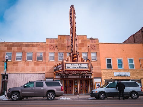 A city full of old stories, now guarded by God, guns, and flags proudly flown.