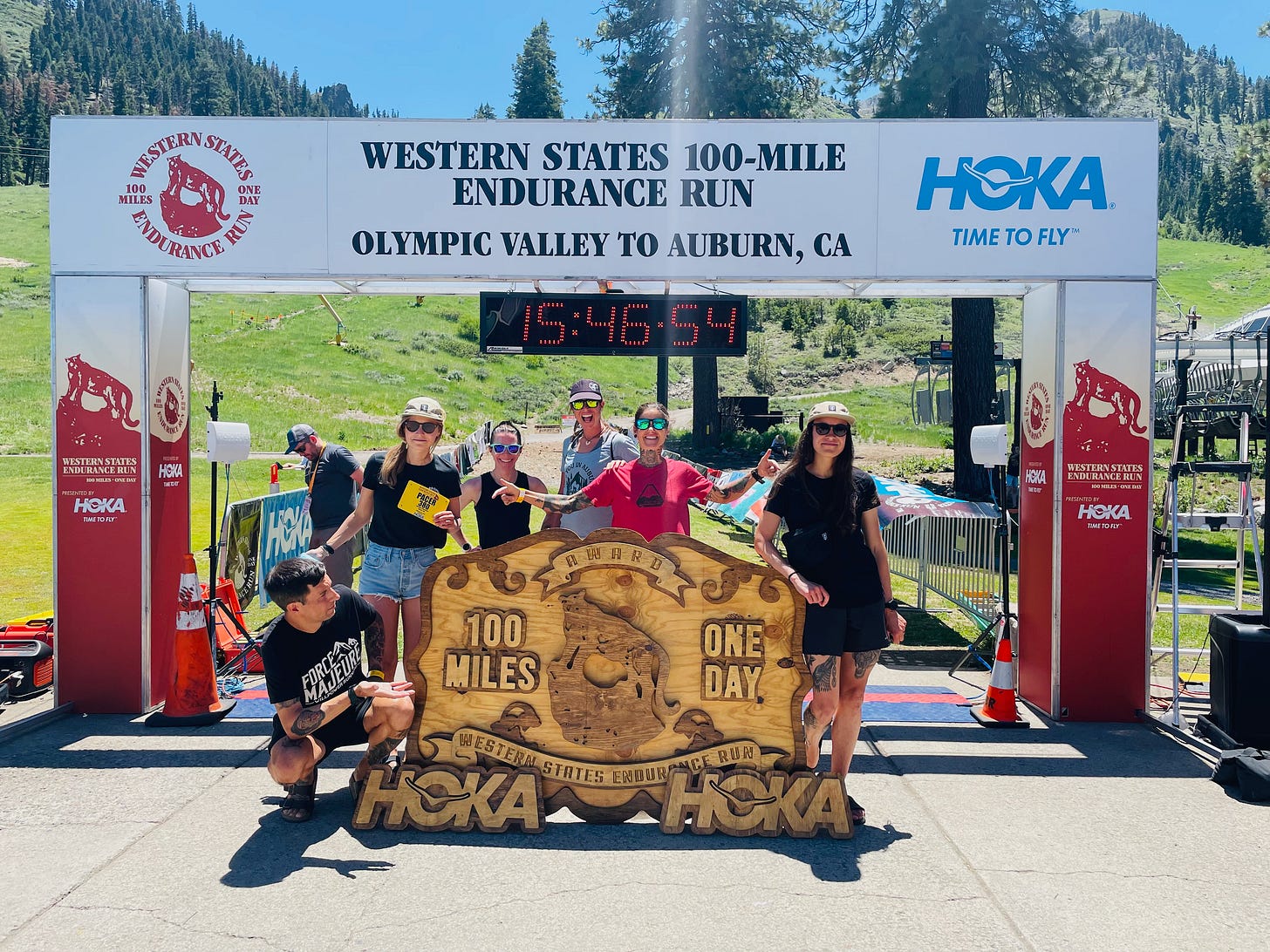The author and his friends posing in front of the Western Sates finish