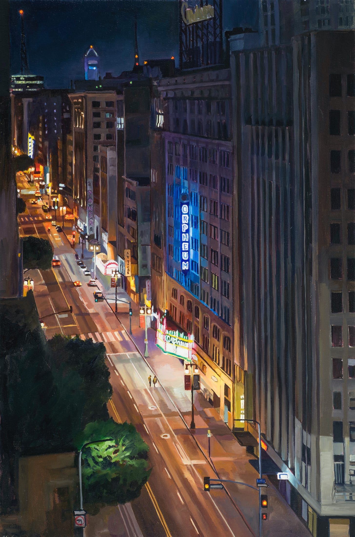 A city street at night

Description automatically generated