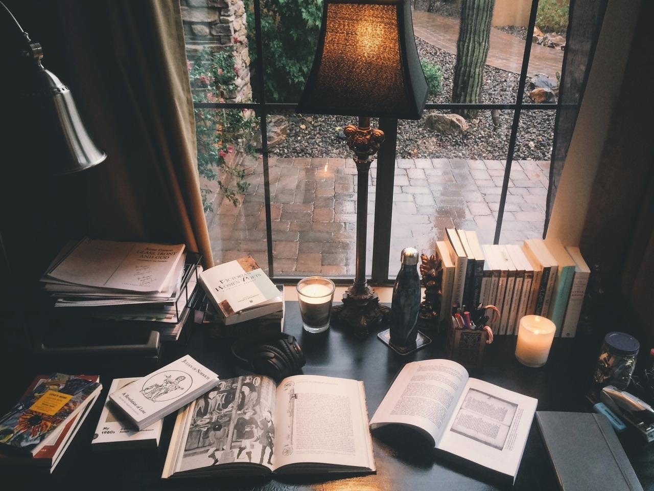 Reading a book on a rainy day : r/CozyPlaces