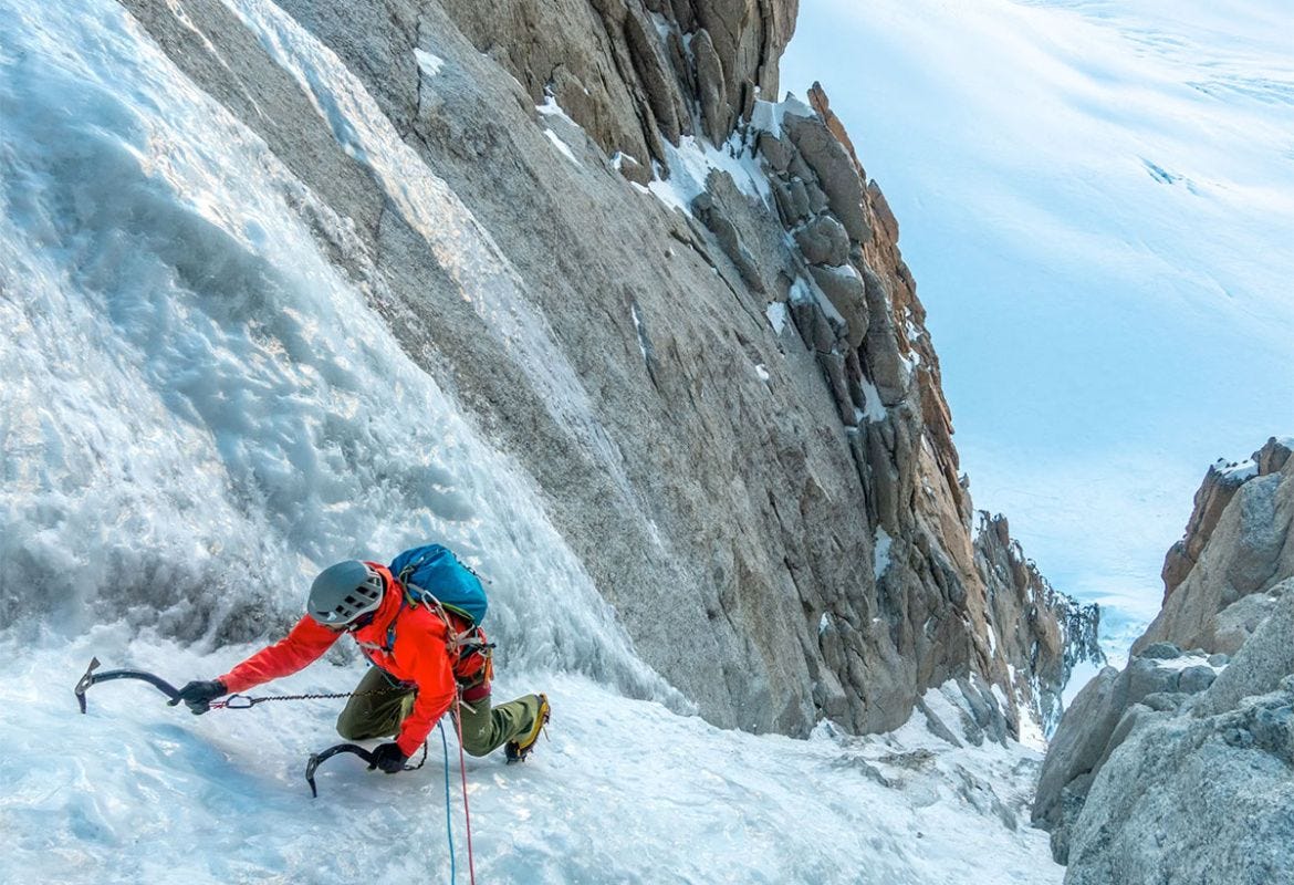Ice climbers ascending a frozen waterfall near Chamonix, France Ice climbers ascending a frozen waterfall near Chamonix, France