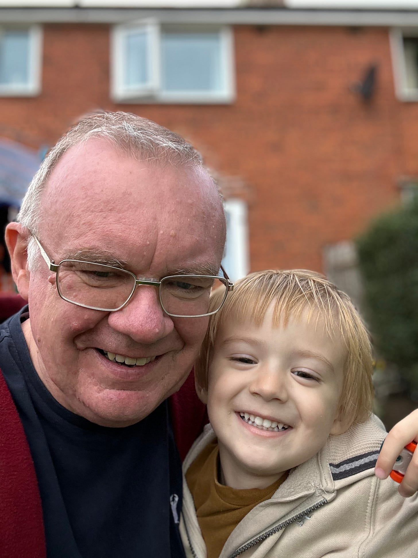 Roland Millward of Roland's Travels with his grandson, Albie.