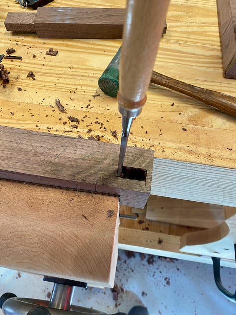 Making the legs involves laying out and cutting the mortises, cutting the tenons in the aprons, and then cutting the tapers on the legs