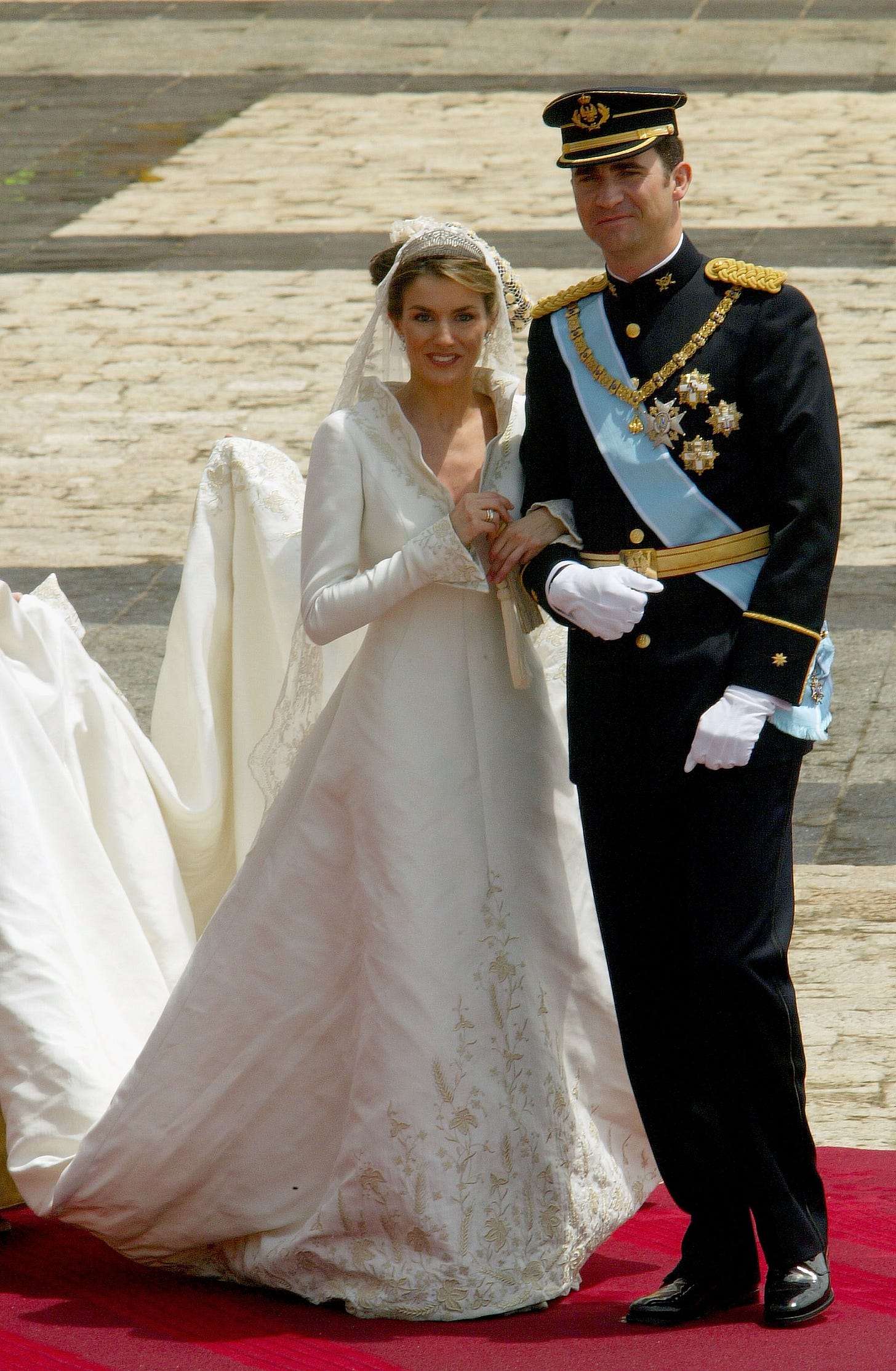 queen letizia and king felipe of spain on their wedding day in 2004 queen letizia and king felipe of spain on their wedding day in 2004