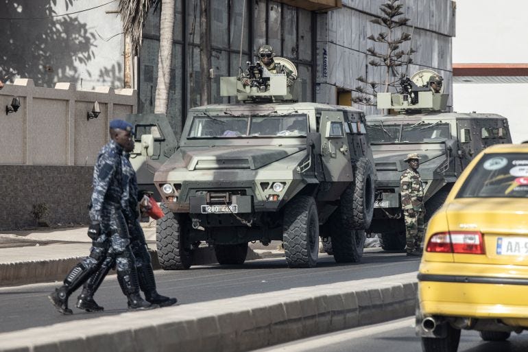 Members of the Senegalese Armed Forces patrol the streets in Dakar, Members of the Senegalese Armed Forces patrol the streets in Dakar,