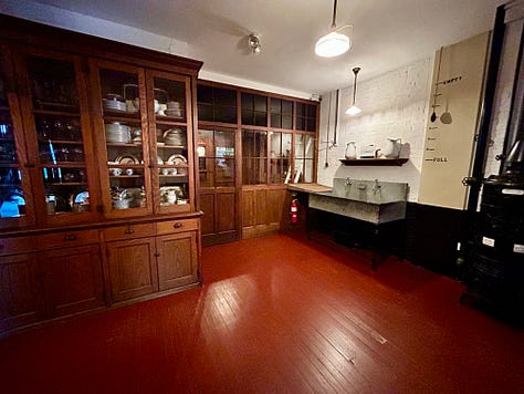 kitchen, pots, pans, plates, sink, utensils