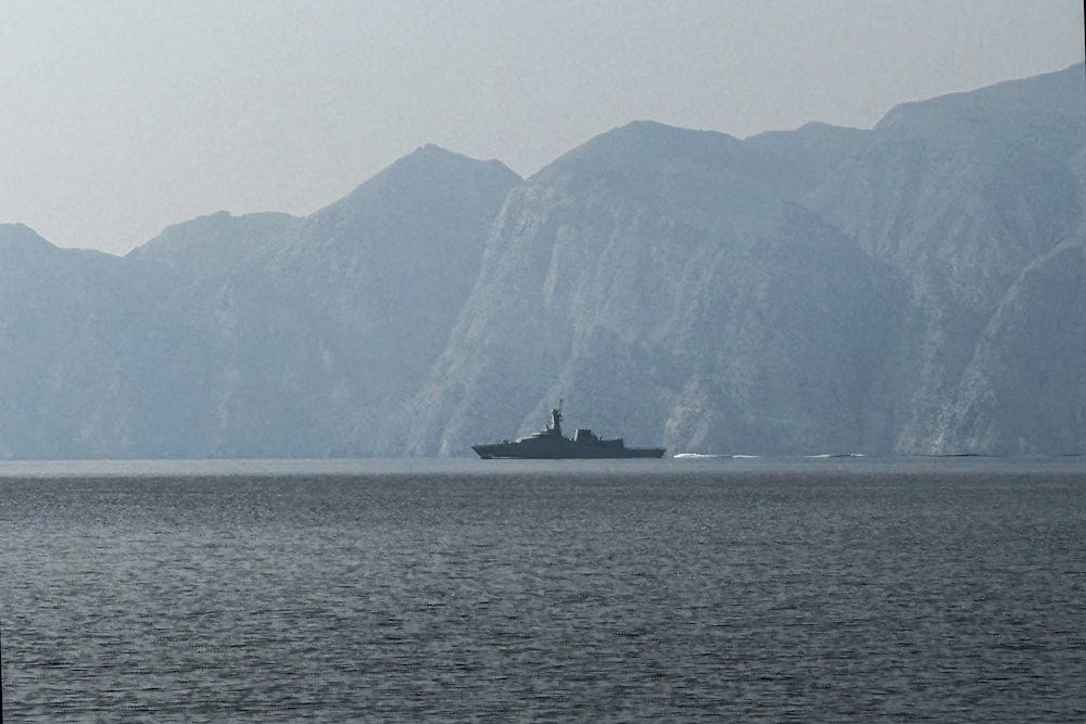 A navy vessel is seen sailing in the Strait of Hormuz A navy vessel is seen sailing in the Strait of Hormuz
