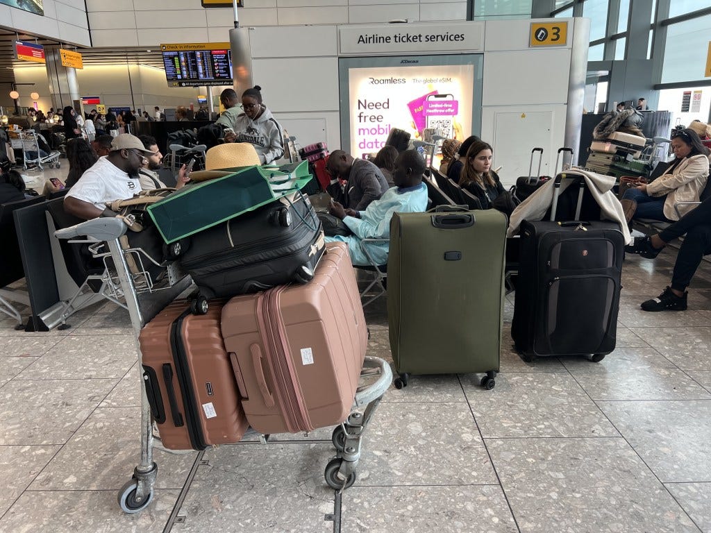 People at T4 London Heathrow Airport, after flights were delayed and cancelled at airports including Heathrow after an alleged cyber attack targeted a service provider for check-in and boarding systems.