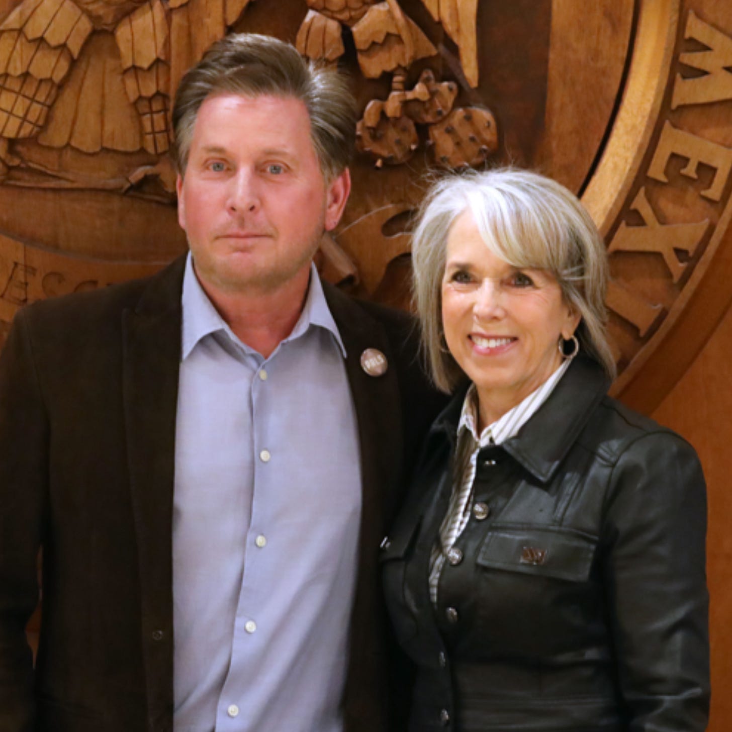 Photo of Emilio Estevez and New Mexico Governor Grisham.