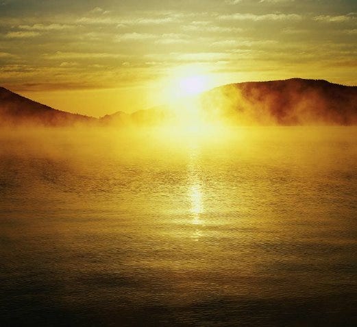 A picture containing water, outdoor, sky, sun

Description automatically generated