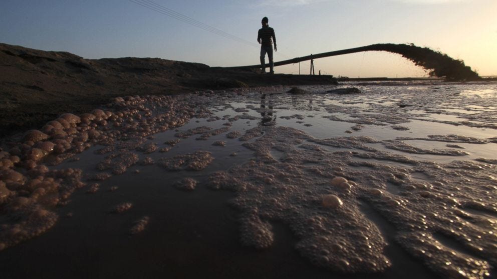 Rare earth discharge liquid flows from a pipeline into a "rare earth lake" near Xinguang village on Nov. 29, 2010 in Baotou, Inner Mongolia of China. Rare earth discharge liquid flows from a pipeline into a "rare earth lake" near Xinguang village on Nov. 29, 2010 in Baotou, Inner Mongolia of China.