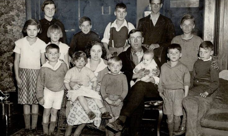 Ironically, this is from a contest called "The Great Stork Derby," where a millionaire offered his estate to the couple that could have the most children.  I feel the parents' look of haunted exhaustion in my soul.