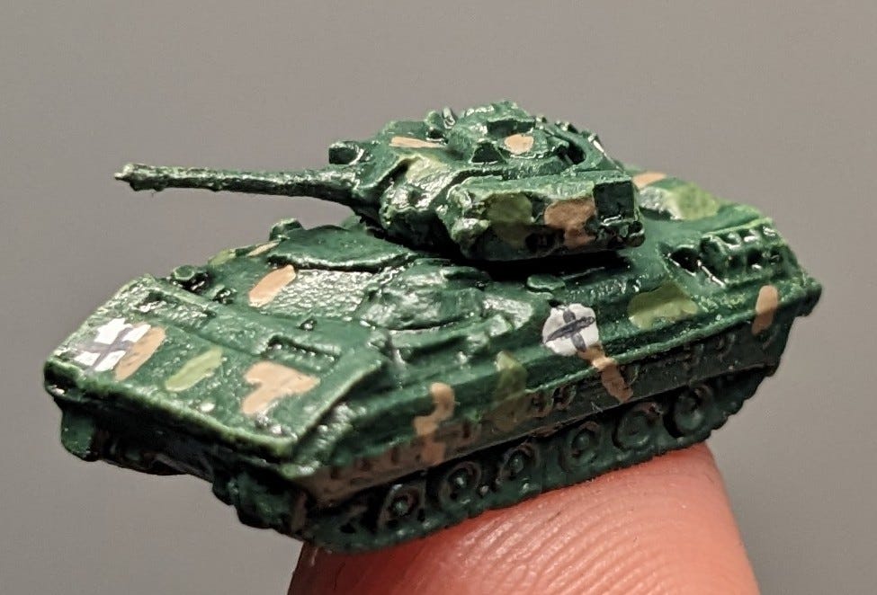 A 6 mm scale Bradley fighting vehicle scale model painted in Ukrainian colours