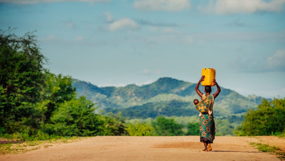 Carrying water can be a pain in the neck | World Vision