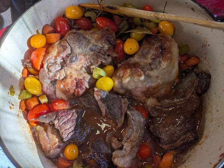 Sauce components and meat combining and coming up to a simmer.