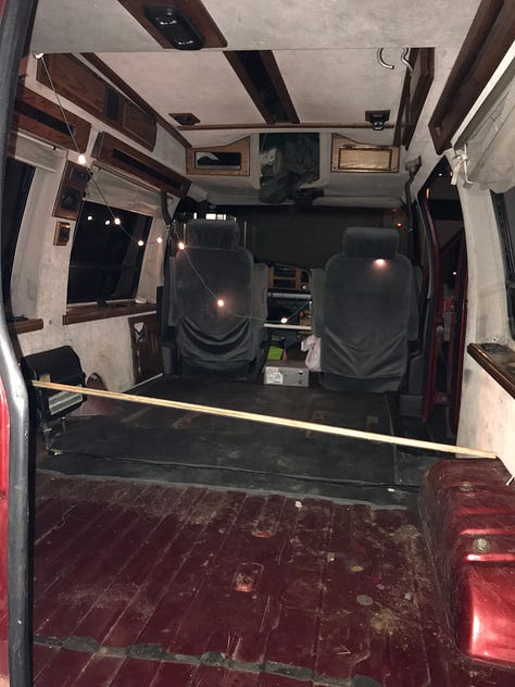1. A gutted diy van. 2. The same van with a bed and sleeping bag and twinkle lights. 3. The same van years later with a kitchen and furniture. 4. Plants on a window ledge in a van. 5. Plants hanging from a van door. 6. A writing desk with notepad, notes, and an orange light inside a van.