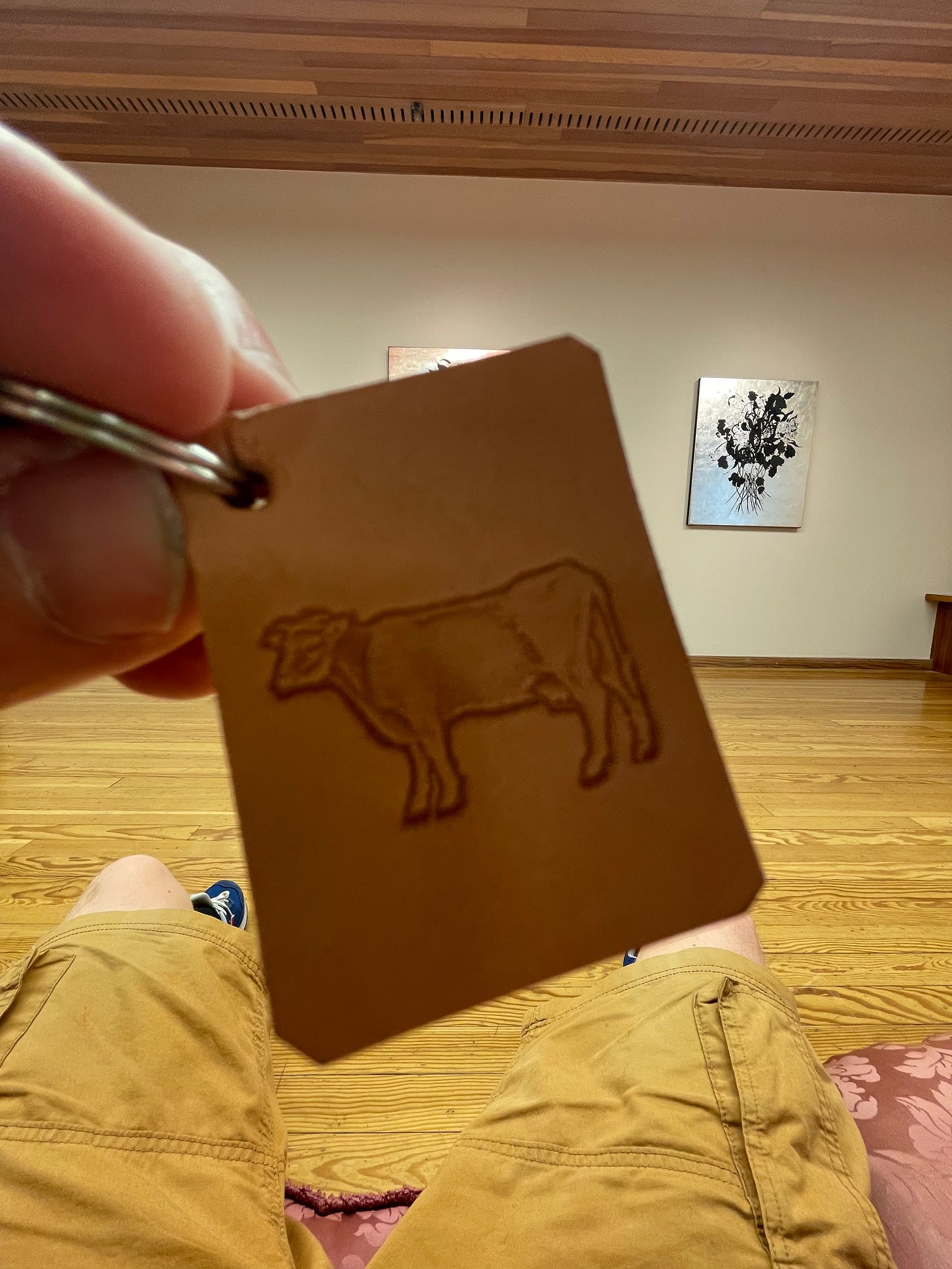 Ben proudly displays his Daisy the Cow keyring