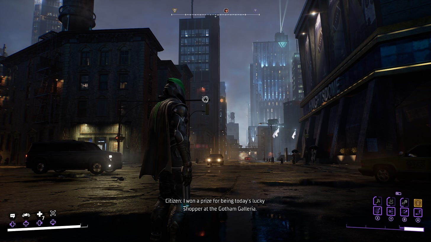 Robin stands in the intersection of a Gotham street. In the distance are skyscrapers. It is night.