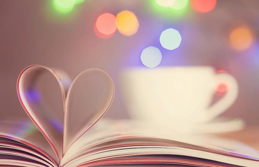 Book love with tea and lights