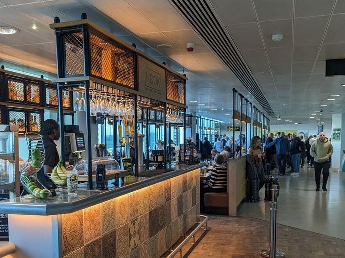 The 'quiet and inviting' Manchester Airport bar with a runway view that not  many people know about - Manchester Evening News