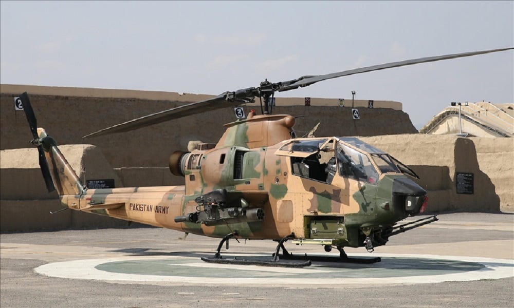 A helicopter on a runway

Description automatically generated with low confidence