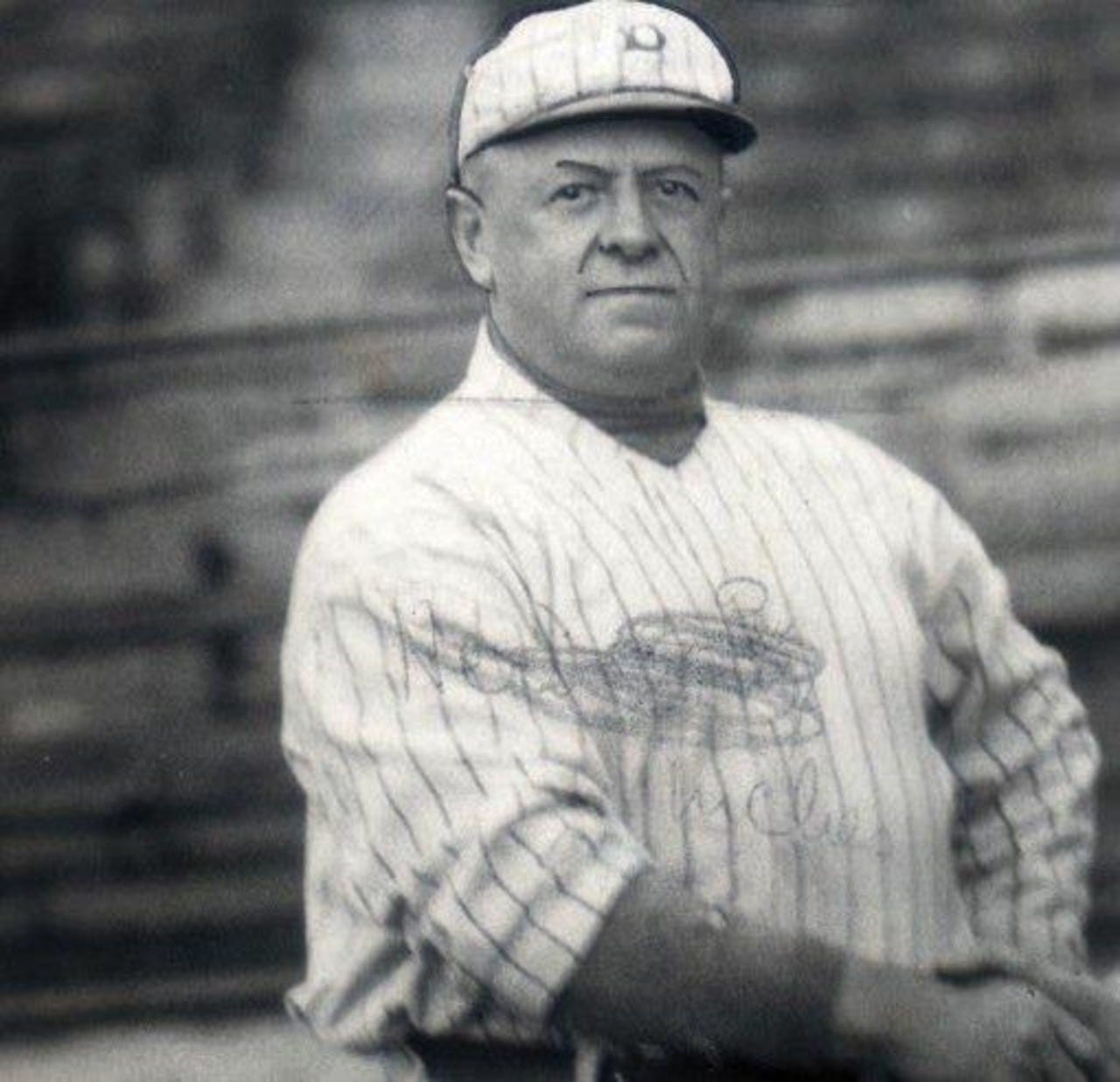 Wilbert Robinson wearing Brooklyn Robins uniform. Wilbert Robinson wearing Brooklyn Robins uniform.