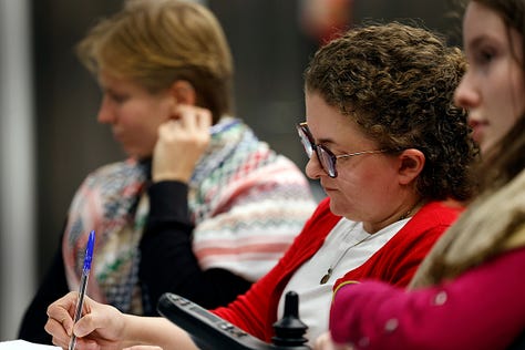 Images include photos of attendees from the Disabled Women & Poverty Event.