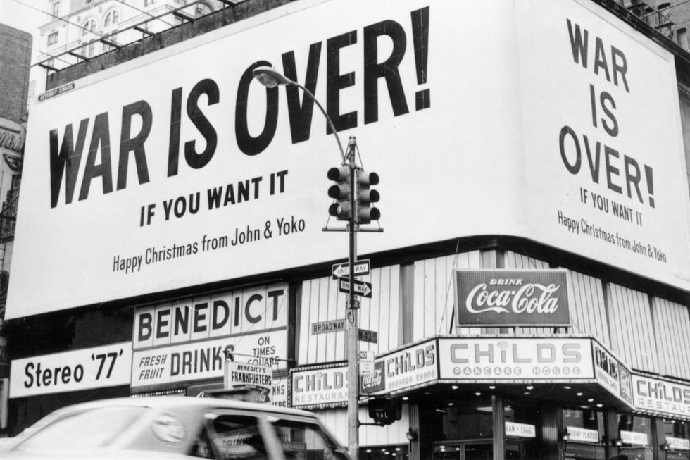 Times Square illuminated at night, a beacon of urban energy in 1970s New York. Times Square illuminated at night, a beacon of urban energy in 1970s New York.