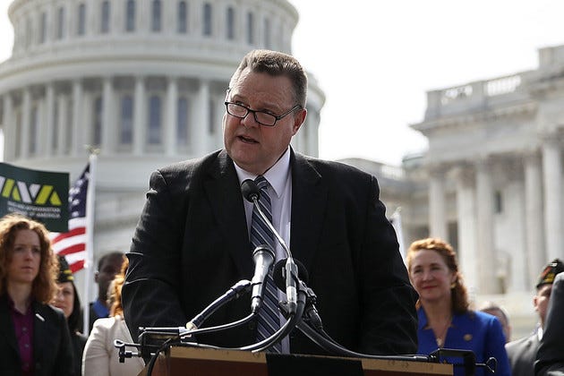 Sen. Jon Tester speaks during a news conference.