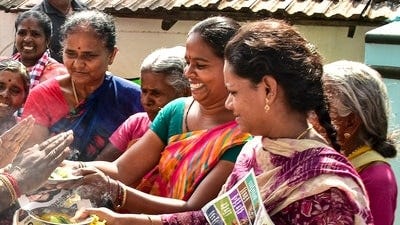 Women in Tamil Nadu's Maravankulam village in Madurai welcome an AIADMK candidate. (PTI)
