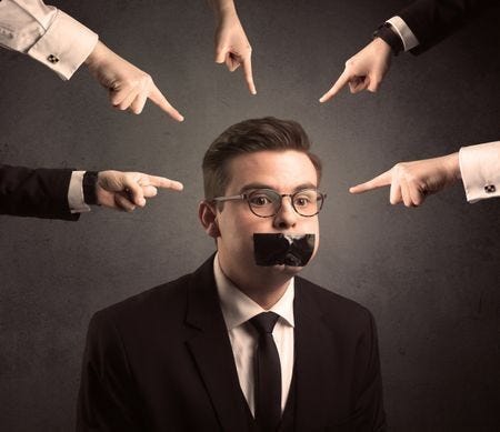 Guy with tape on mouth and fingers pointing at him Guy with tape on mouth and fingers pointing at him